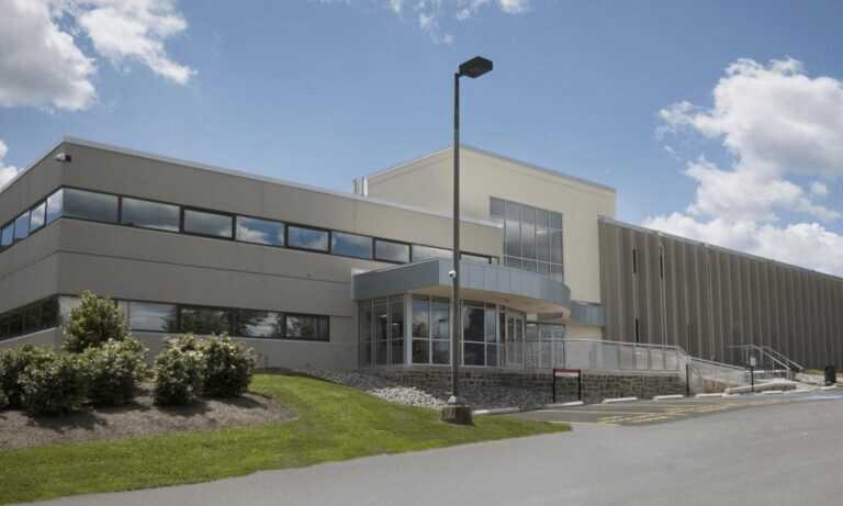 Front view of the Cherry Hill Campus on a clear day