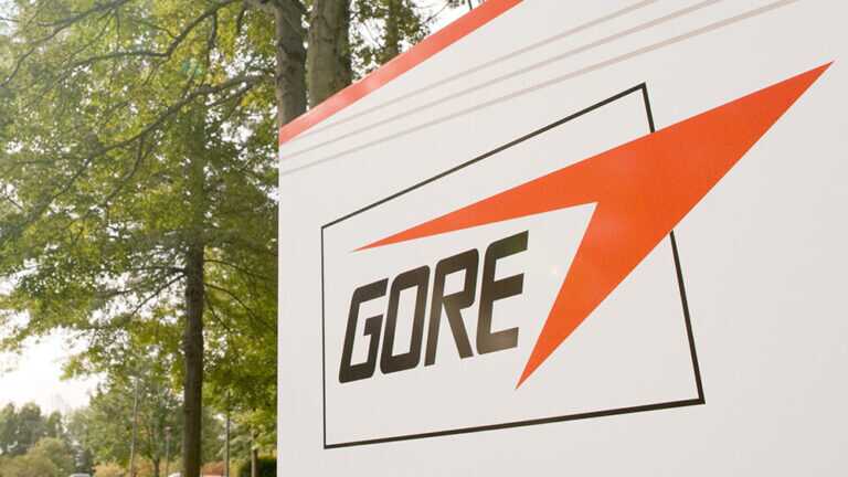 A white sign with showing the GORE logo
