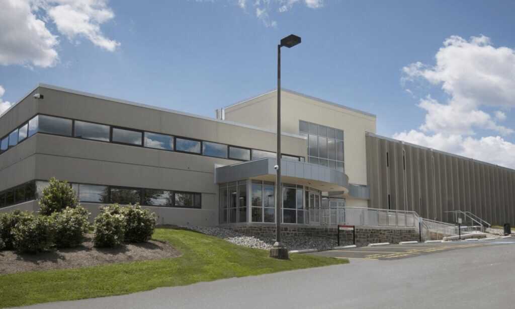 Front view of the Cherry Hill Campus on a clear day